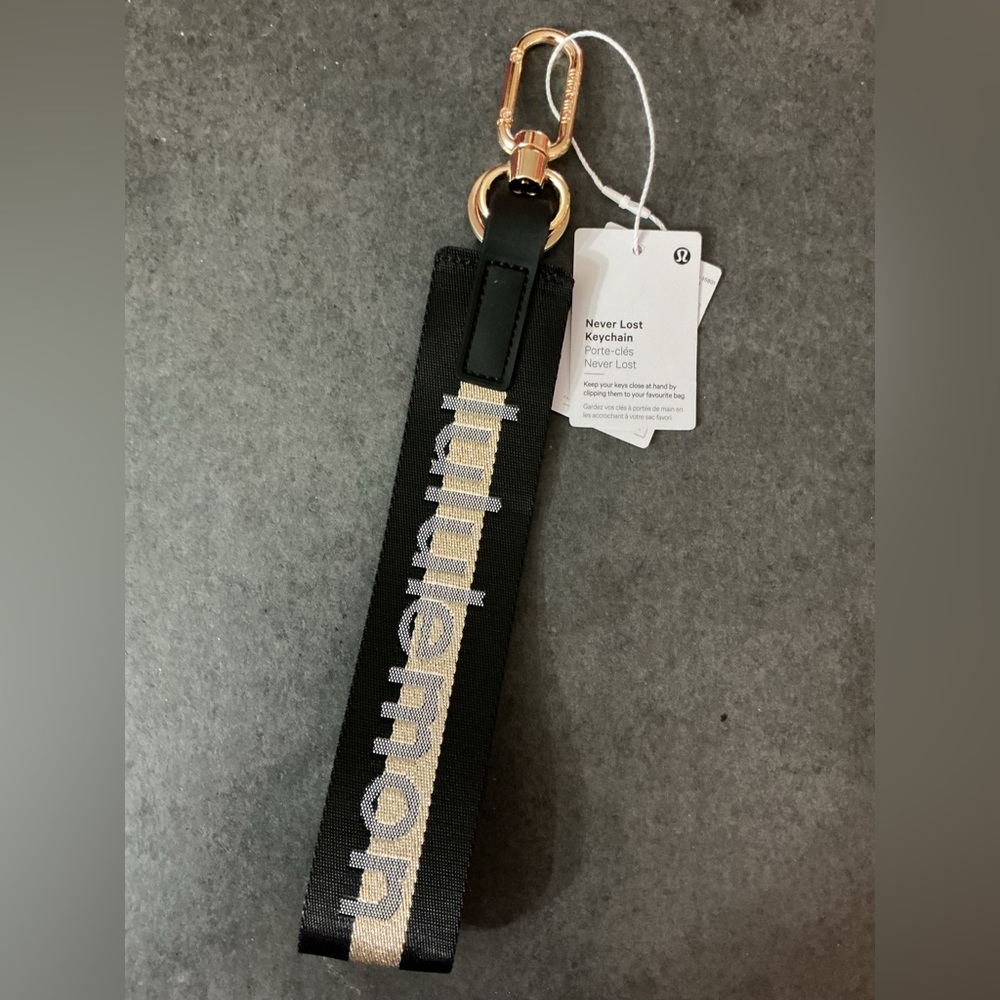 lululemon athletica Black and Gold never lost Keychain
